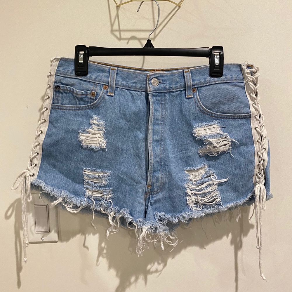 High waisted lace up distressed jean shorts